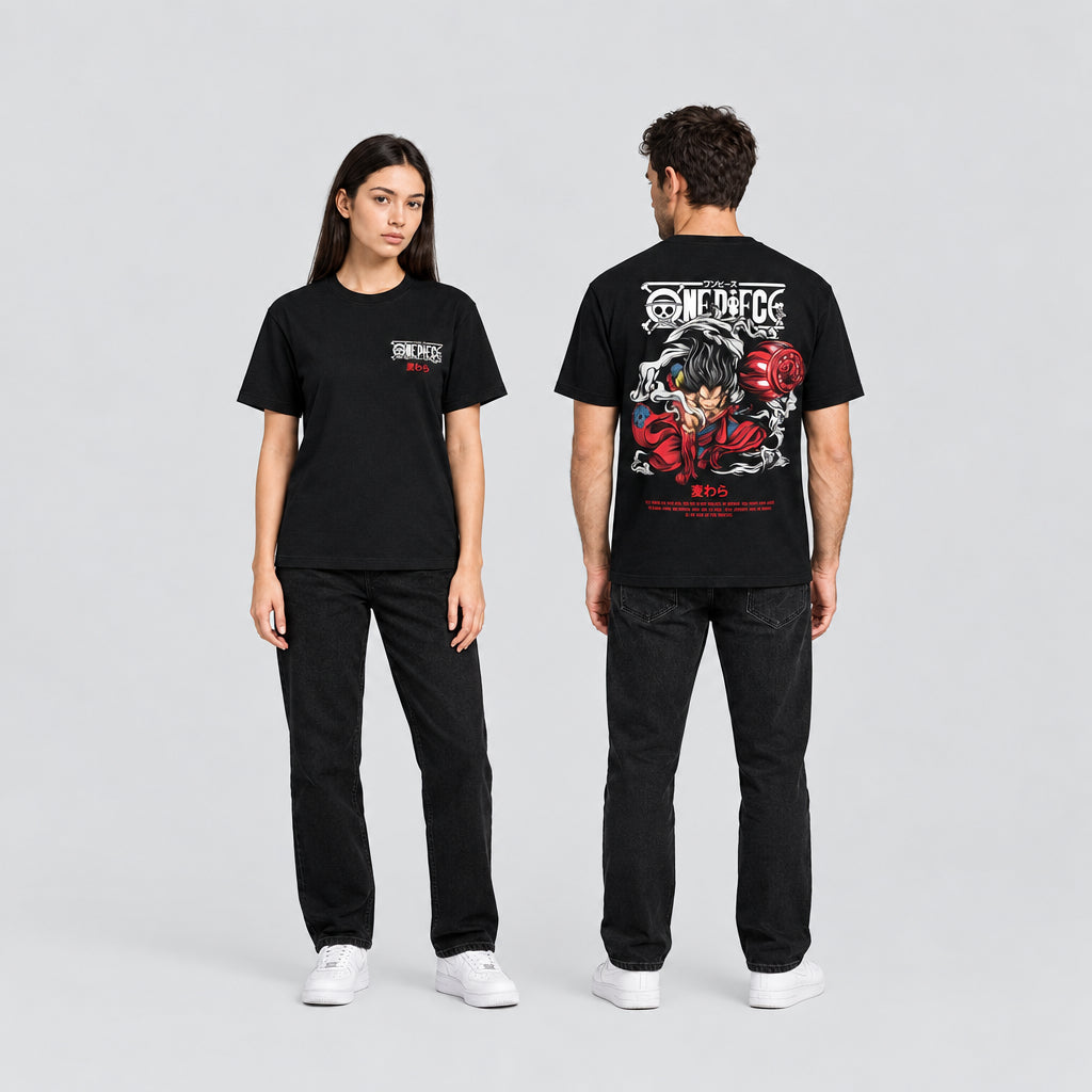 Two people wearing black t-shirts with a graphic design on a gray background